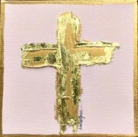 Gold cross on pink
